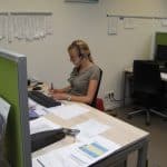 dianthus employee working at her desk